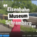 Screenshot eines YouTube-Video-Thumbnails mit dem Titel "Eisenbahn Museum Schramberg" und dem Videoplayer darunter, der eine Person vor dem Museumseingang zeigt.